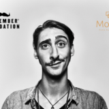 man with a moustache, black and white photo, Movember logo and Mosaic logo